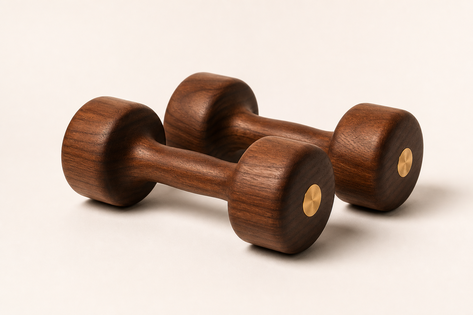 Lifeventra wooden dumbbells on a warm studio background